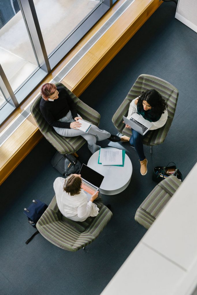 overhead view of meeting with 3 women
