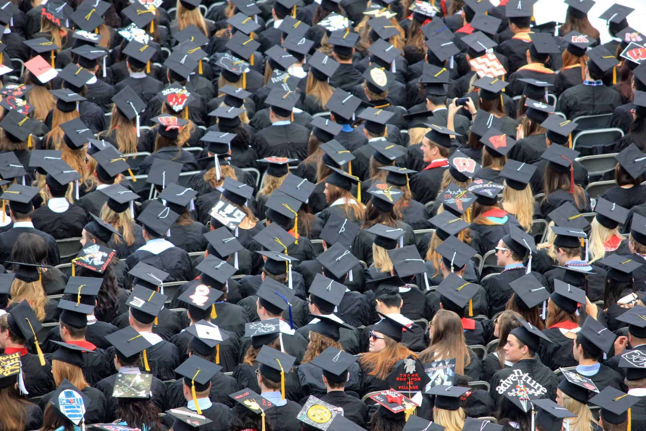rows of graduates in their caps at a graduation ceremony